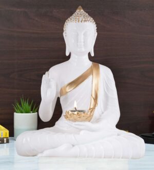white buddha statue with diya holder white gold decor