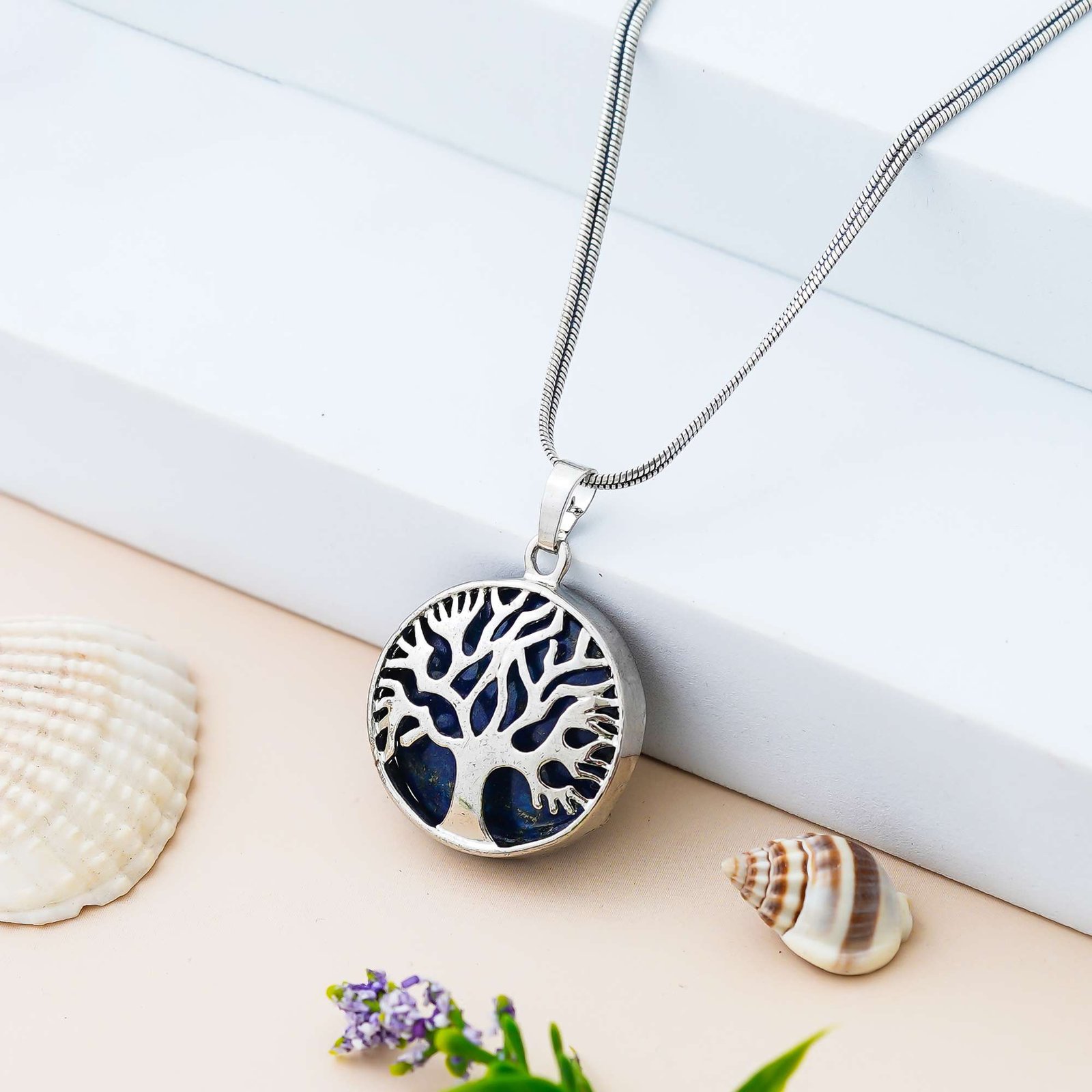 Blue Lapis Tree of Life Pendant for Spiritual Balance blue lapis tree of life pendant with silver symbolic design